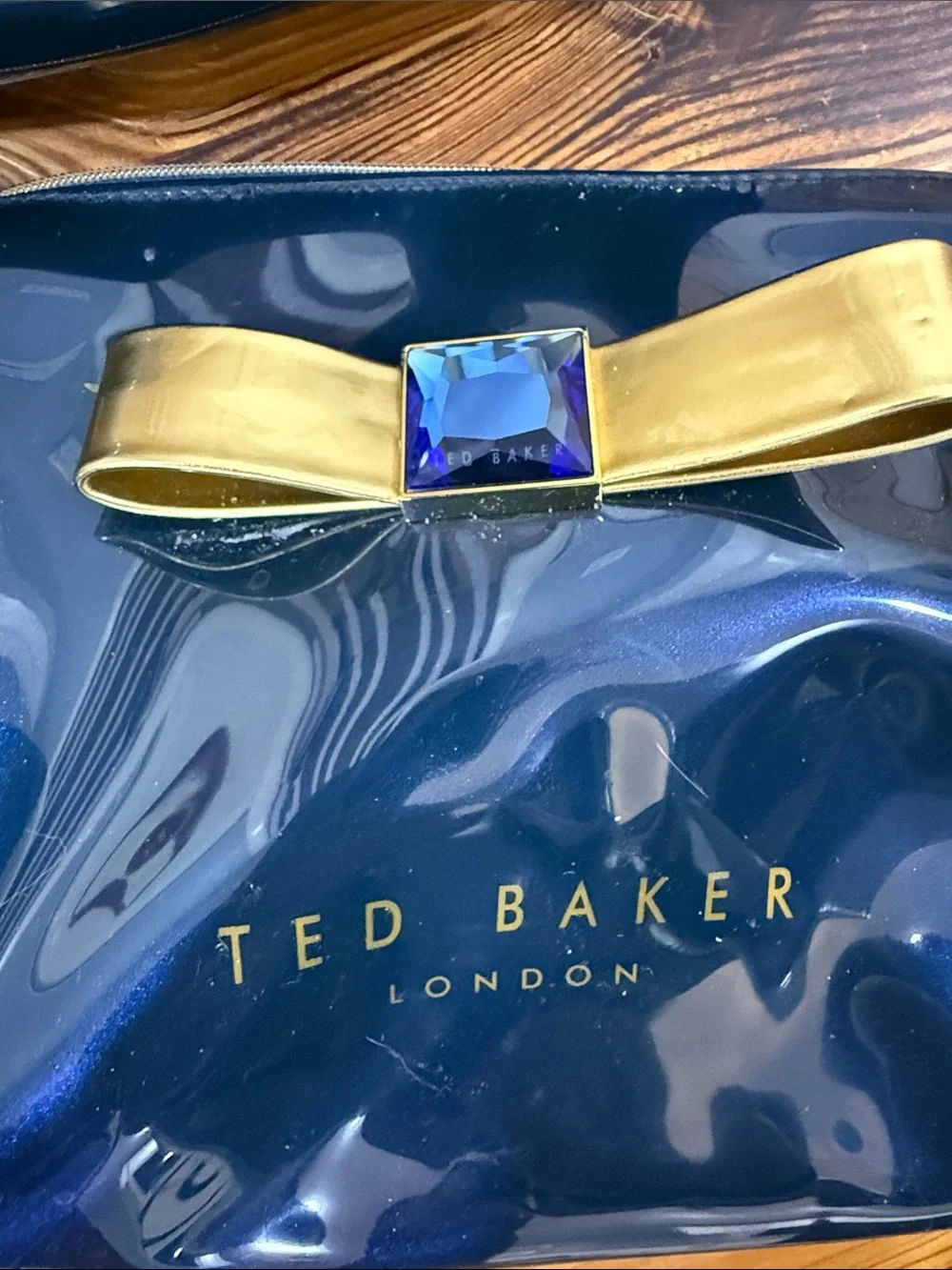 Ted Baker Navy Patent Cosmetic Pouch Set with Gold Bow and Blue Gem